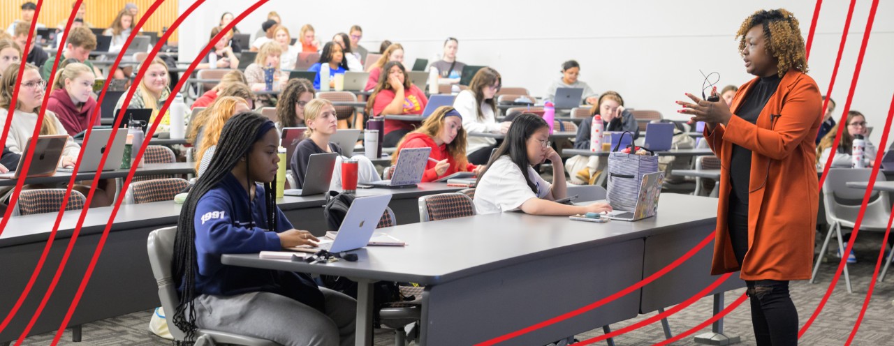instructor in front of classroom