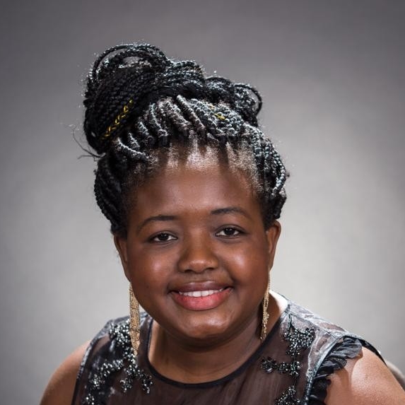 Headshot of Cleopatra Kum, PhD, RN